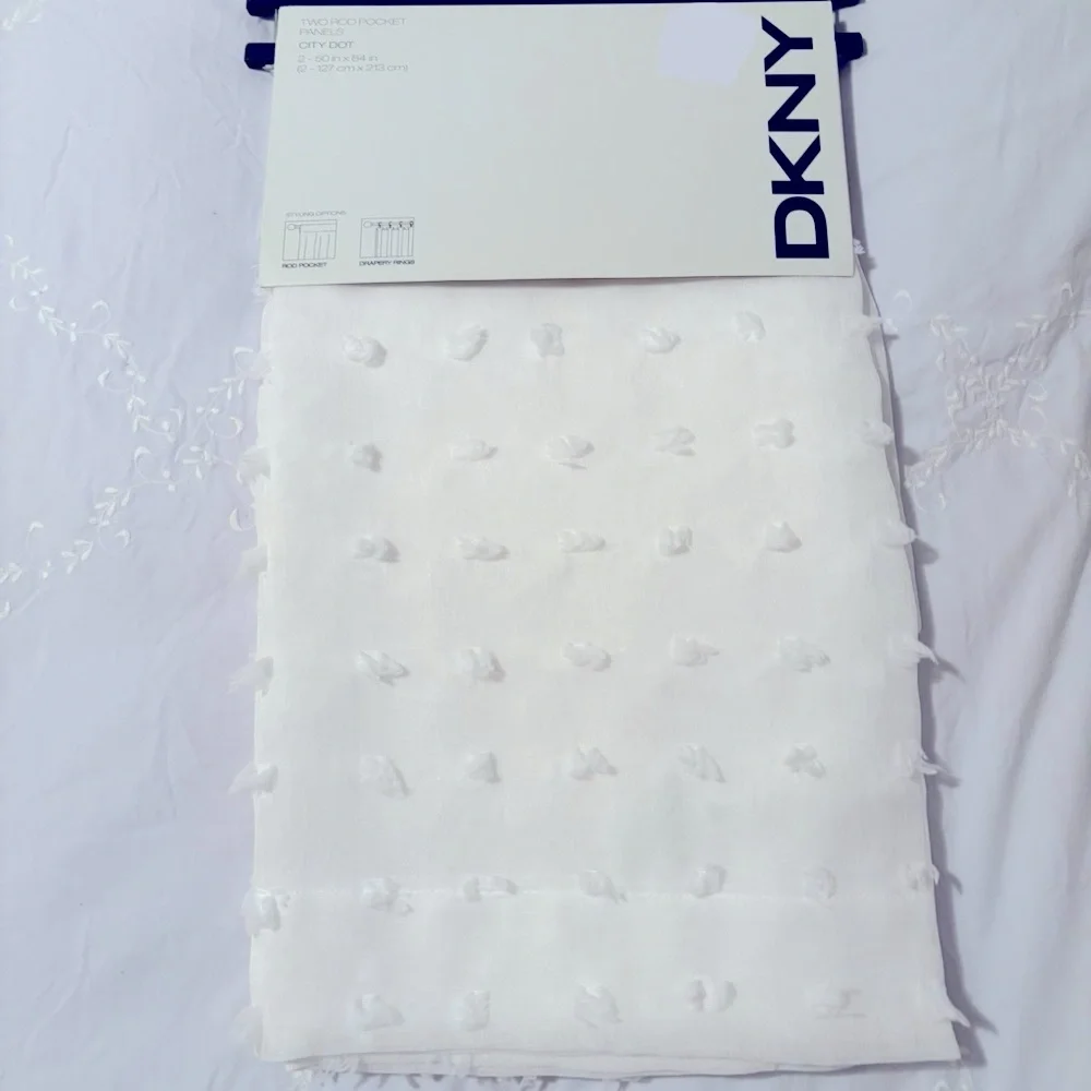 DKNY White sheer Curtain Panel Swiss dot.   2 panels 50in x  84in
